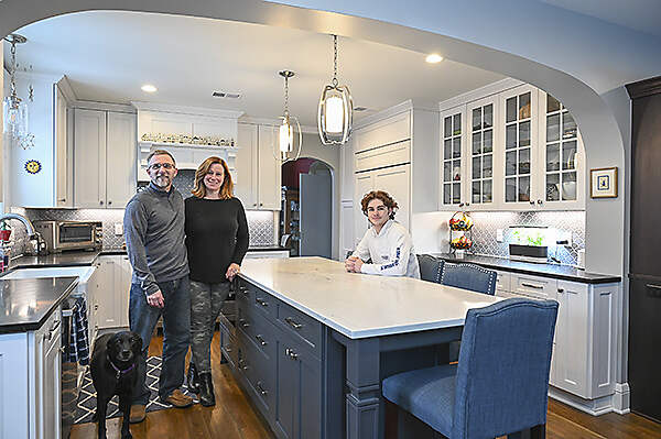 family in renovated kitchen